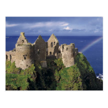 A rainbow strikes medieval Dunluce Castle on Post Card