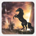 A rearing stallion at sunset square sticker