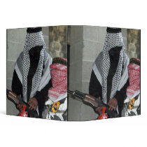 A role-playing enemy aggressor arms a dummy binders