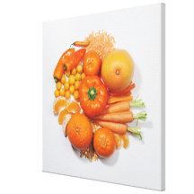 A selection of orange fruits & vegetables. canvas prints
