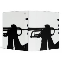 A service member plays a tune binder