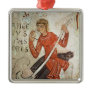A shepherd playing a flageolet ornament