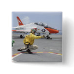 A shooter aboard the aircraft carrier pin