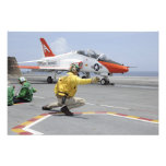 A shooter aboard the aircraft carrier