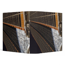 A solar array wing vinyl binders