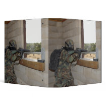 A soldier acts as an opposition force binders