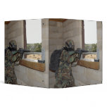 A soldier acts as an opposition force binders