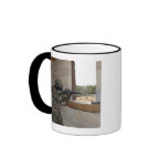 A soldier acts as an opposition force coffee mugs
