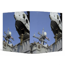 A soldier fast-ropes binder