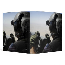 A soldier provides security binder