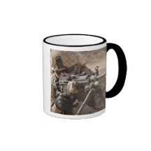 A squad automatic weapon gunner provides securi mug