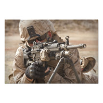 A squad automatic weapon gunner provides securi