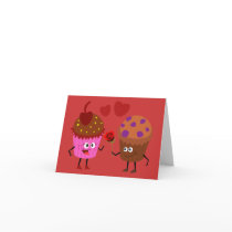 a Stud Muffin giving a flower to a Cupcake Greeting Card
