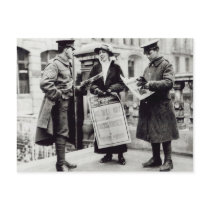 A Suffragette selling newspapers to two Post Cards