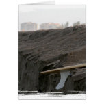 A surfboard sits on the beach in Florida on cliff Greeting Card