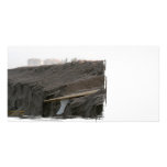 A surfboard sits on the beach in Florida on cliff Photo Greeting Card