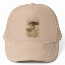 A teddy bear with a flower, hat