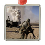 A US Army Soldier reacts to a controlled explos Ornaments