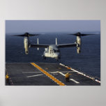 A V-22 Osprey aircraft prepares to land Posters
