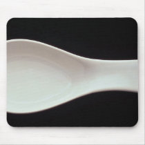 A white porcelain spoon mouse pad