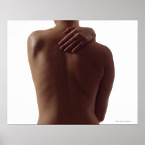 A woman's bare back with one hand reaching posters