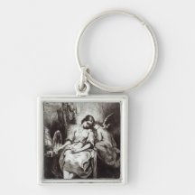 A Young Woman Dozing with an Angel Key Chain