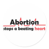 Abortion stops a beating heart round sticker