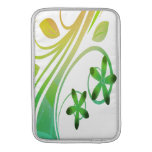 Abstract Green and Orange Flowers on Black Macbook Air Sleeves