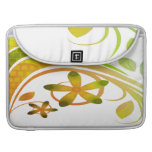 Abstract Green and Orange Flowers on Black Macbook Pro Sleeves