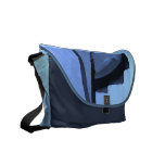 Abstract in shades on blue. messenger bag