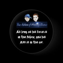 Adam and Matty face in the pillow round button.