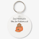 round_keychain - An adorable African American baby sits inside an orange pumpkin and kid style text reads "Just arrived in time for Halloween!" on babys 1st Halloween T-shirts, tote bags, magnets, and more.: Sizes 
