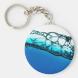 Air bubbles in blue water key chain