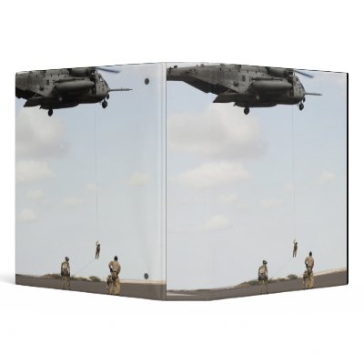 Air Force pararescuemen conduct a combat insert Binders by stocktrek