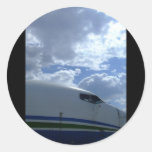 Airliner-cockpit-with-clouds-in-background Sticker