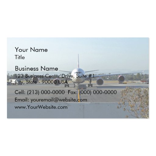 Airplane at airport with blue sky in background business card templates (front side)