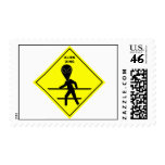 Alien Crossing Postage Stamp