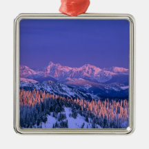 Alpenglow strikes the peaks of Glacier Christmas Ornament