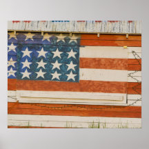 American flag painted onto fireworks stand near posters