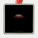 American football ball on black background christmas ornament