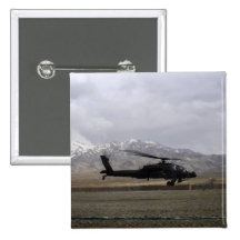 An AH-64A Apache taking off Pin