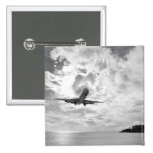 An airliner comes in for a landing at Princess Pinback Button