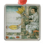 An Aztec feather artisan Christmas Ornament
