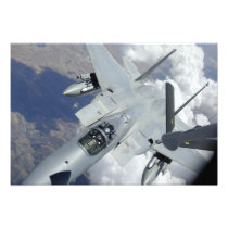 An F-15 Eagle pulls away from a KC-135