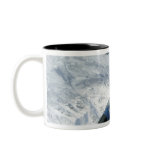An F-16 Aggressor sits in contact position Mugs