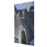 An F-22 Raptor moves into position to receive f Canvas Prints