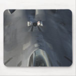 An F-22 Raptor moves into position to receive f Mousepad