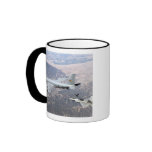 An F-22 Raptor receives fuel from a KC-135 Mugs