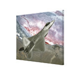An F/A-22 Raptor flies a training mission Canvas Print