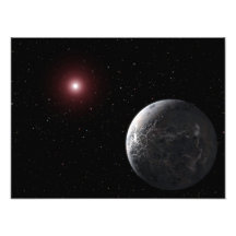 An icy/rocky planet orbiting a dim star photo
